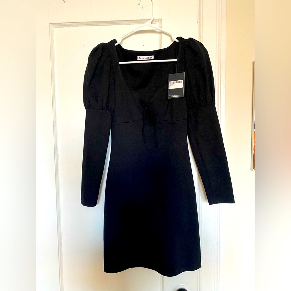 Reformation dress, short black with puffed sleeves in a size small